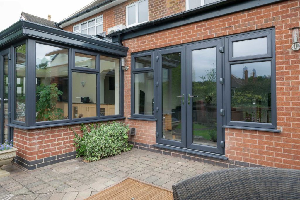 Grey uPVC doors and windows on patio